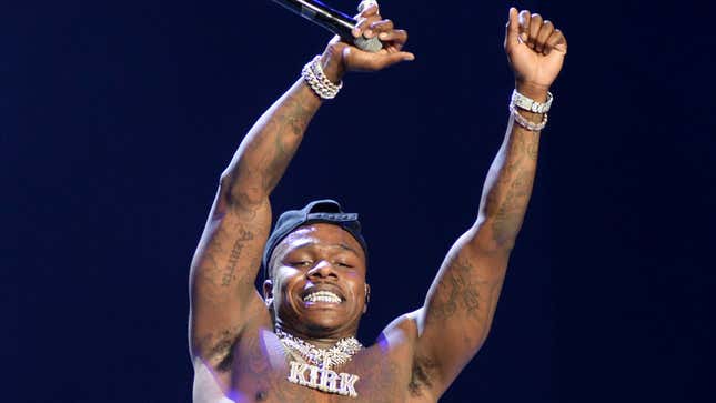 Image for article titled Still Looking for the Path to World Peace? We Found It in DaBaby’s Energy and Smile