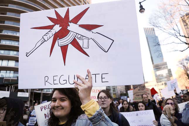  Thousands of people, many of them students, march against gun violence in Manhattan during the March for Our Lives rally on March 24, 2018 in New York City.