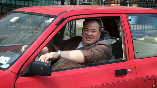 Image for article titled Area Man Proud He Can Still Fit Into Car From High School