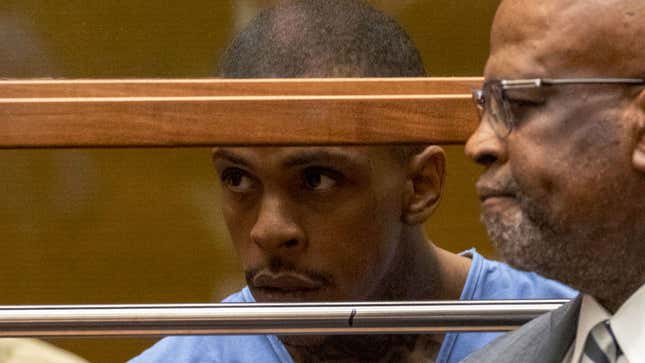 Eric Holder, charged with murder in the death of Nipsey Hussle, seen with his now-former defense attorney Christopher Darden