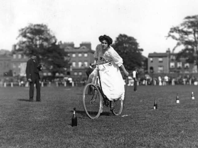 July 1905: A young woman competes in a gymkhana for bicycle riders at Richmond.