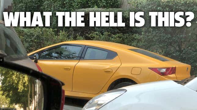 Image for article titled Help Us Identify This Really Weird Yellow Sedan UPDATED