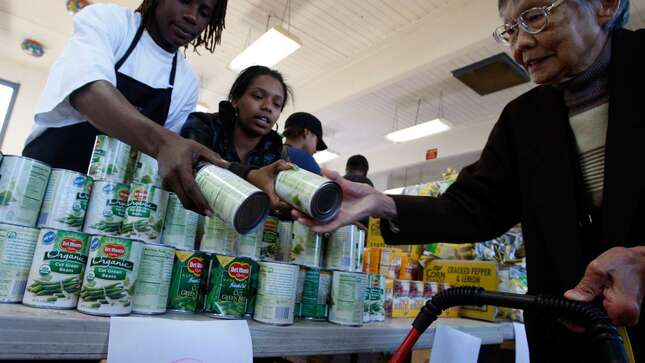 Food supplied by the San Francisco Food Bank for Thanksgiving dinners is distributed by volunteers at a neighborhood food pantry November 20, 2007 in San Francisco, California.