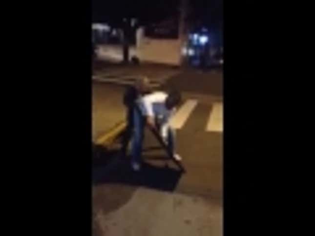 Angry Brazil Fan Destroys TV In Street