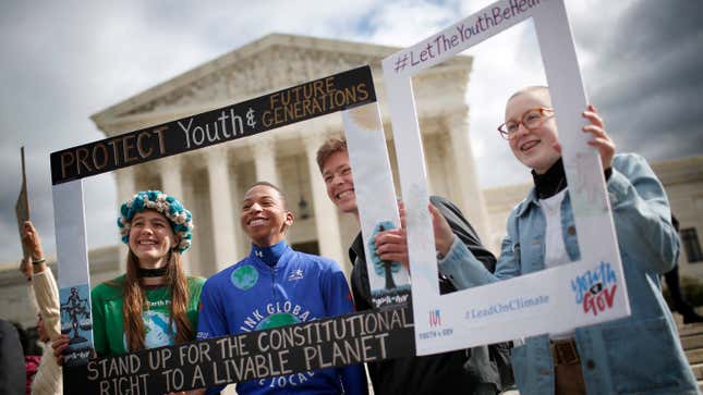 Protesters attend a rally outside the U.S. Supreme Court held by the group Our Children’s Trust October 29, 2018, in Washington, D.C., in support of the Juliana v. U.S. lawsuit brought on behalf of 21 youth plaintiffs.