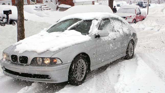 Image for article titled Neighbors Come Together To Watch BMW Owner Struggle In Snow