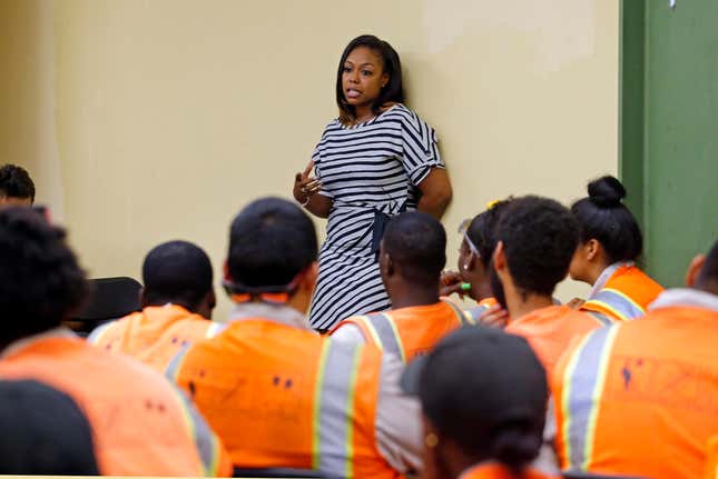 Rodney King’s daughter Lora King, 32, speaks to a group of young people who have had their own run-ins with police at a meeting of the Los Angeles Conservation Corps, which provides at-risk youth with job training, education and work, in downtown Los Angeles Thursday, Sept. 15, 2016.