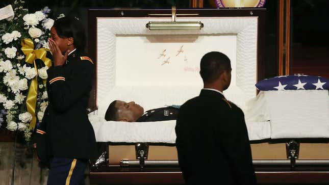 Mourners pay their respect during a funeral service for Army 2nd Lt. Richard Collins III, on May 26, 2017, in Upper Marlboro, Md. 