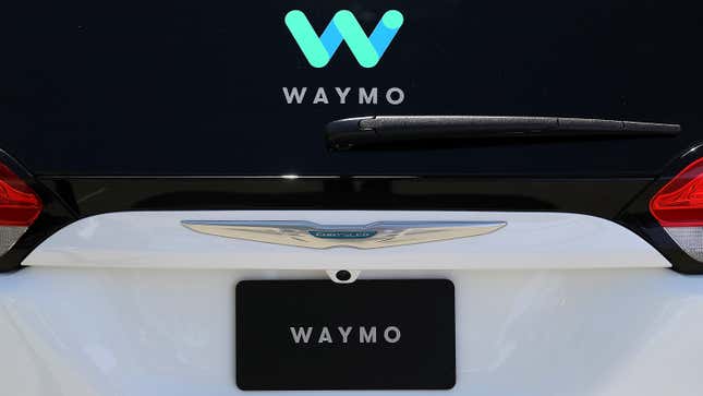 The Waymo logo is displayed on a self-driving vehicle at the Google I/O 2018 Conference at Shoreline Amphitheater on May 8, 2018 in Mountain View, California. 