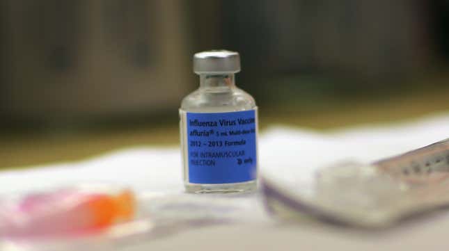 A bottle of influenza virus vaccine is seen at the CVS pharmacy’s MinuteClinic on December 4, 2012 in Miami, Florida. 