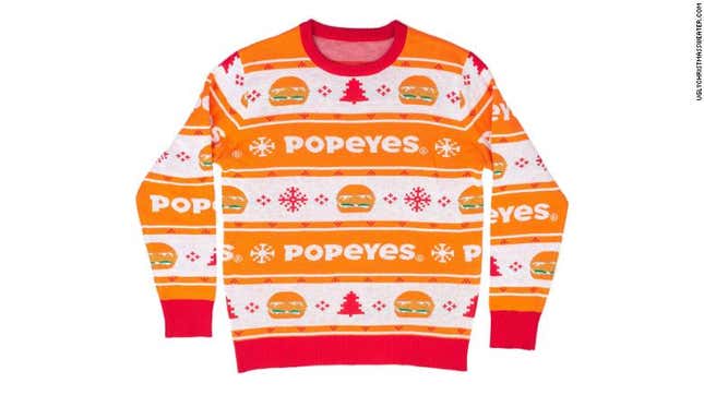 Image for article titled Because #TheChickening Knows No Bounds, Popeyes’ Chicken Sandwich Jumps the Shark—Onto an Ugly Christmas Sweater