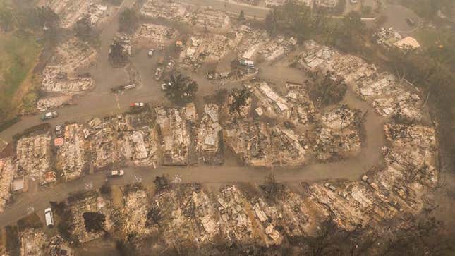 In this aerial view from a drone, damaged homes are seen in a mobile home park that was destroyed by wildfires on September 11, 2020 in Ashland, Oregon.