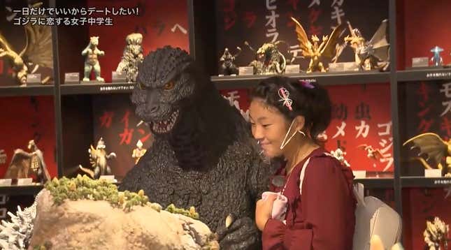 Image for article titled Teenager Finally Achieves Her Dream Of Dating Godzilla