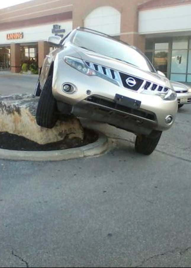Image for article titled Here's Another SUV-Defeating Rock. Does Your Town Have One? Let Us Know.