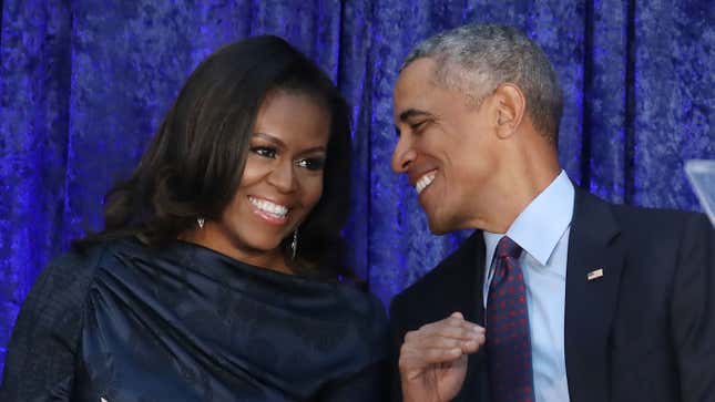 Former U.S. President Barack Obama and first lady Michelle Obama participate in the unveiling of their official portraits during a ceremony on February 12, 2018 in Washington, DC. 