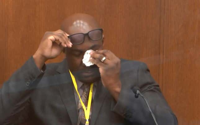 Philonise Floyd, brother of George Floyd, becomes emotional as he testifies as Hennepin County Judge Peter Cahill presides over court Monday, April 12, 2021