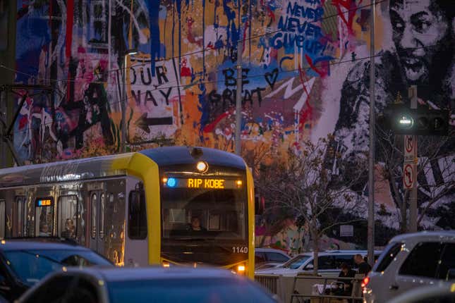 Signage on a Metro train near Staples Center pays tribute to Kobe Bryant before the first Lakers game since the former NBA star and his 13-year-old daughter Gianna died in a helicopter crash, on January 31, 2020 in Los Angeles, California. Kobe and “Gigi” were among nine people killed in a the crash as they were flying to his Mamba Sports Academy where he was to coach her in a tournament game