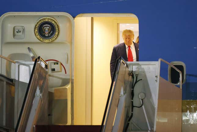 President Donald Trump prepares to exit from Air Force One at the Palm Beach International Airport on December 23, 2020 in West Palm Beach, Florida. 