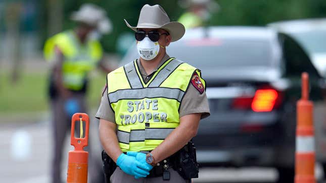 A Texas DPS State Trooper at a coronavirus checkpoint near the border with Louisiana in Orange, Texas, in April 2020.