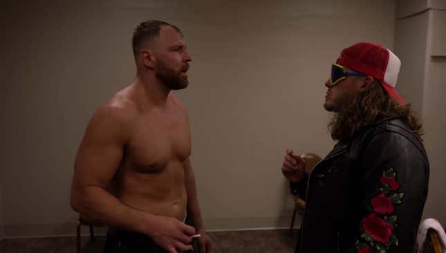 Jon Moxley taking away “Bad Boy” Joey Janela’s cigarette.
