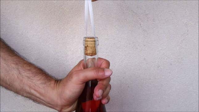Remove a Cork Stuck Inside a Wine Bottle With a Ribbon