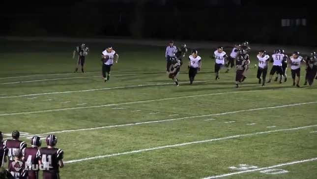 Watch A Giant High School Football Player Dominate His Tiny Opponents