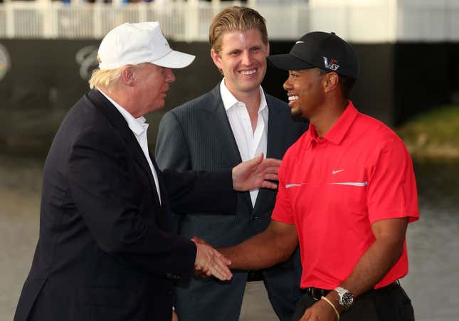 In this March 2013 photo, Donald Trump greets Tiger Woods after the final round of the World Golf Championships-Cadillac Championship as Eric Trump looks on at the Trump Doral Golf Resort &amp; Spa  in Doral, Fla. 