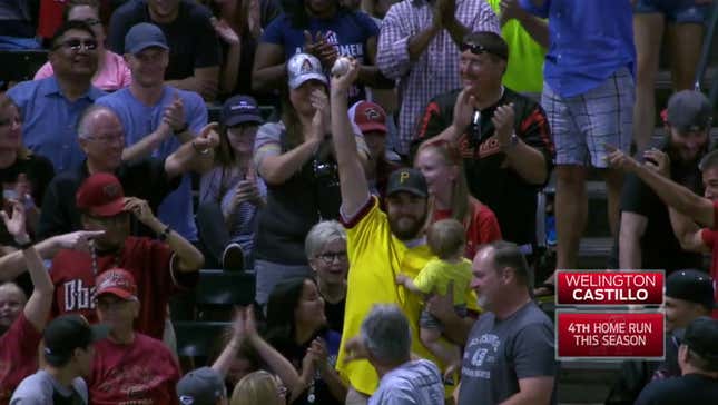 Man Holding Infant Catches Home Run Ball