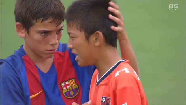 Cute Little Spanish Kids Console Distraught Little Japanese Kids After Wrecking Them At Soccer<em></em>