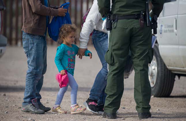  A young child is seen as she along with other migrants are processed by Border Patrol agents after being detained when they crossed illegally into the United States from Mexico on June 02, 2019 in Sunland Park, New Mexico.