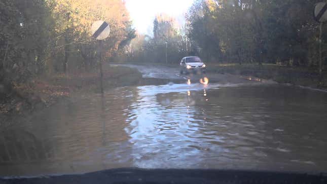 'Charge!' Yells Man Moments Before Flooding His Car