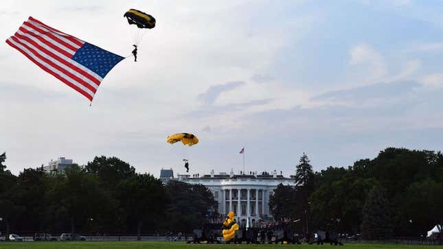 Washington, D.C. on July 4, 2020. Army parachuters carrying a U.S. flag at the White House event on the South Lawn.