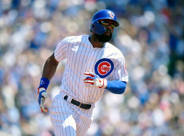 Jason Heyward #22 of the Chicago Cubs rounds the bases after his solo home run in the first inning against the Milwaukee Brewers at Wrigley Field on August 04, 2019 in Chicago, Illinois.