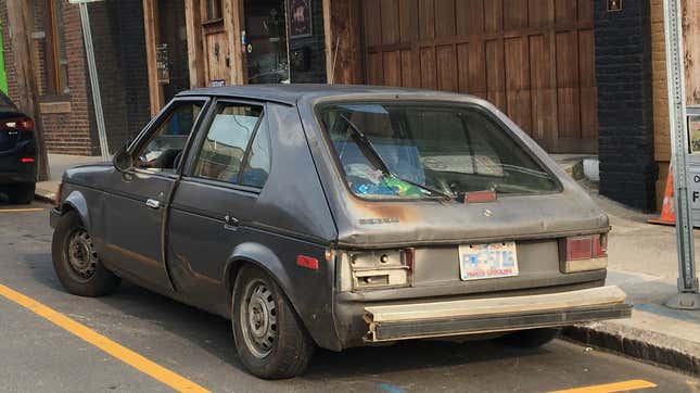Image for article titled Help Me Understand the Mystery of the Sign of the Two Dodge Omnis, Good and Bad