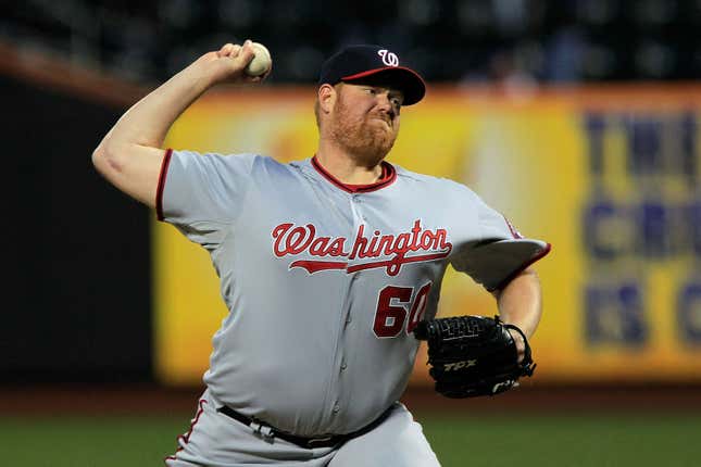 Todd Coffey in 2011, showing the scar from his first Tommy John surgery. (Chris Trotman/Getty Images)
