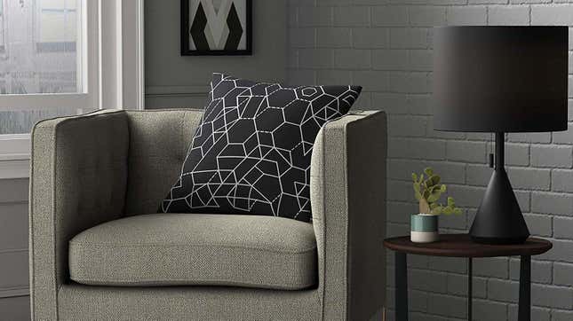 Matte black lamps absorb light, rather than reflecting it, giving this table lamp from Rivet a totally unique look when turned on.