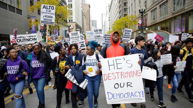 Demonstrators protest Donald Trump’s visit to Chicago outside Trump International Hotel &amp; Tower on Oct. 28, 2019, in Chicago, where Trump also trashed the city while speaking to a police chiefs group.