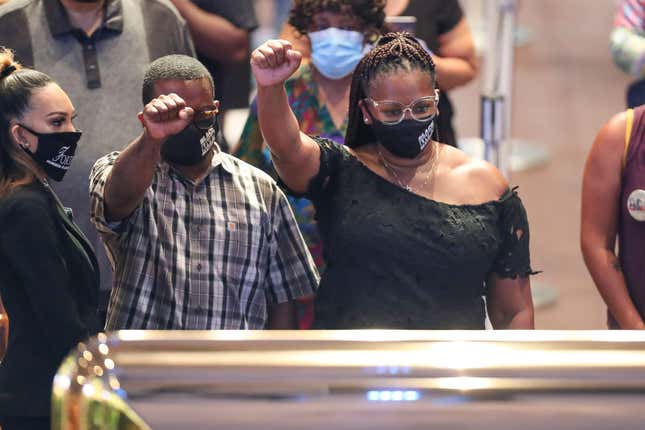 Mourners view the casket of George Floyd during a public visitation Monday, June 8, 2020, at The Fountain of Praise Church in Houston. Floyd died after being restrained by Minneapolis Police officers on May 25.