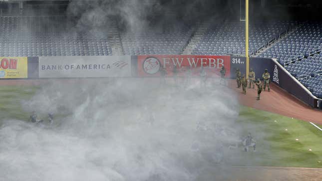Image for article titled Federal Troops Tear-Gas Yankees Off Field So Trump Can Throw Out First Pitch