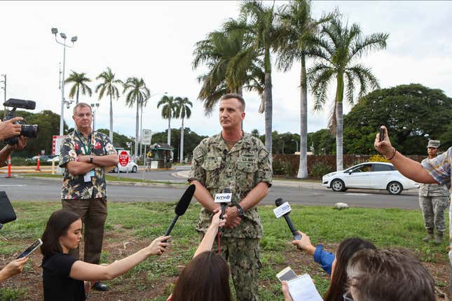 Rear Admiral Robert Chadwick answers questions at a press conference outside of the Nimitz Gate entrance to Joint Base Pearl Harbor-Hickam on December 4, 2019 in Honolulu, United States. 