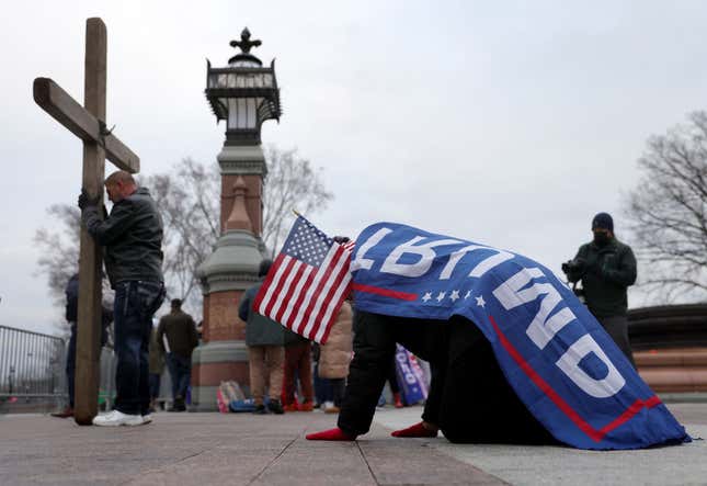 Supporters of President Donald Trump pray outside the U.S. Capitol January 06, 2021 in Washington, DC.