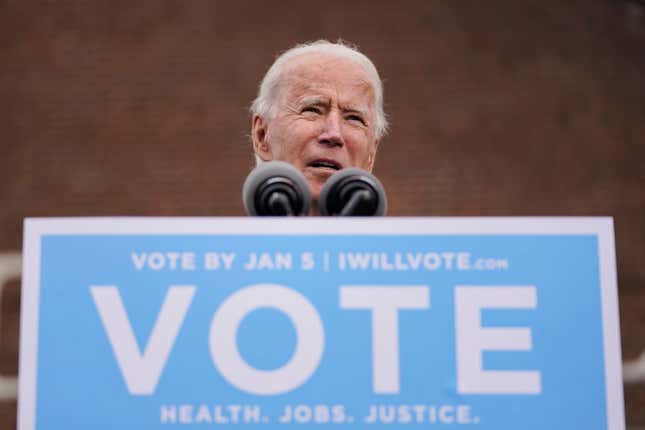 U.S. President-elect Joe Biden speaks during a drive-in rally for U.S. Senate candidates Jon Ossoff and Rev. Raphael Warnock at Pullman Yard on December 15, 2020 in Atlanta, Georgia. 