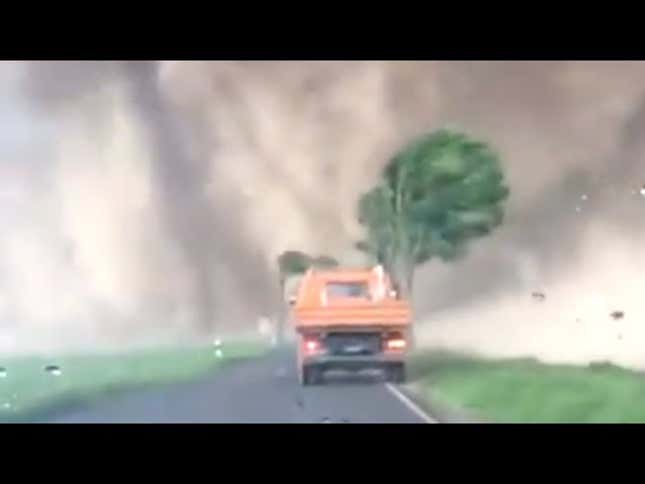 Watch A Foul-Mouthed Guy Get His Car Run Over By A Tornado