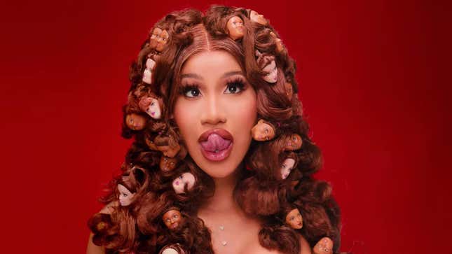Image for article titled Cardi B Using a White Man As a Table, and Other Important Moments from the 'Up' Video