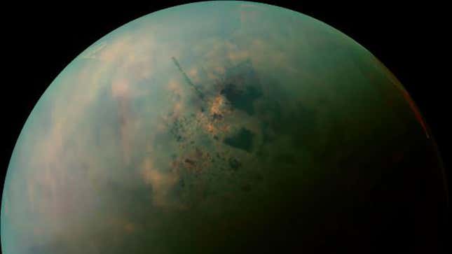 A false-color mosaic Titan’s polar regions. Kraken Mare is the dim splotch to the right of center. 