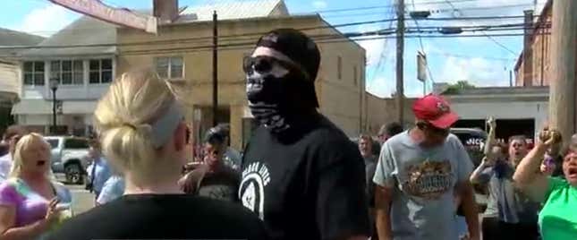 Protesters and counterprotesters face off against each other on the second day of demonstrations in Bethel, Ohio on June 15.