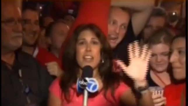 Elated Blackhawks Fan Won't Stop Wagging Tongue Near Reporter's Face