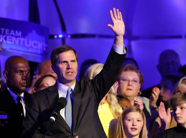 Gov.-elect Andy Beshear celebrates with supporters after voting results showed the Democrat holding a slim lead over Republican Gov. Matt Bevin at C2 Event Venue on Nov. 5, 2019, in Louisville, Ky.  