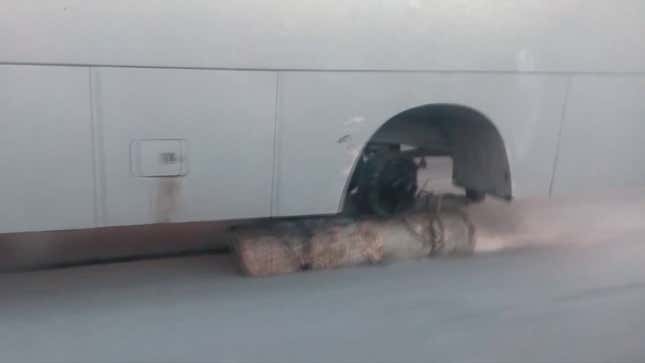 Replacing a Bus Wheel with a Giant Log Will Apparently Work in a Pinch