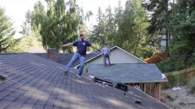 Watch This Roofer Become a Slave to the Rhythm